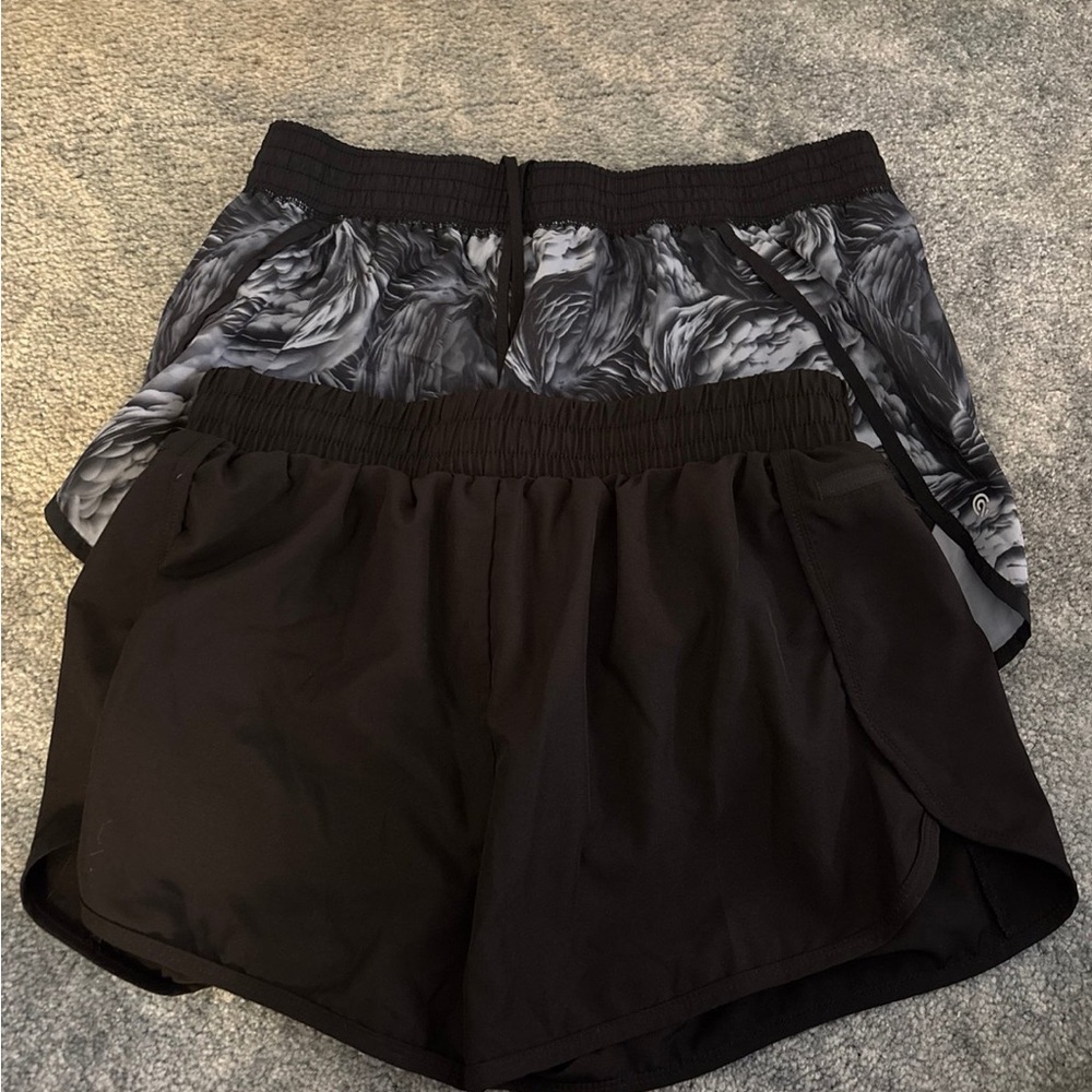 TWO women’s athletic shorts- large